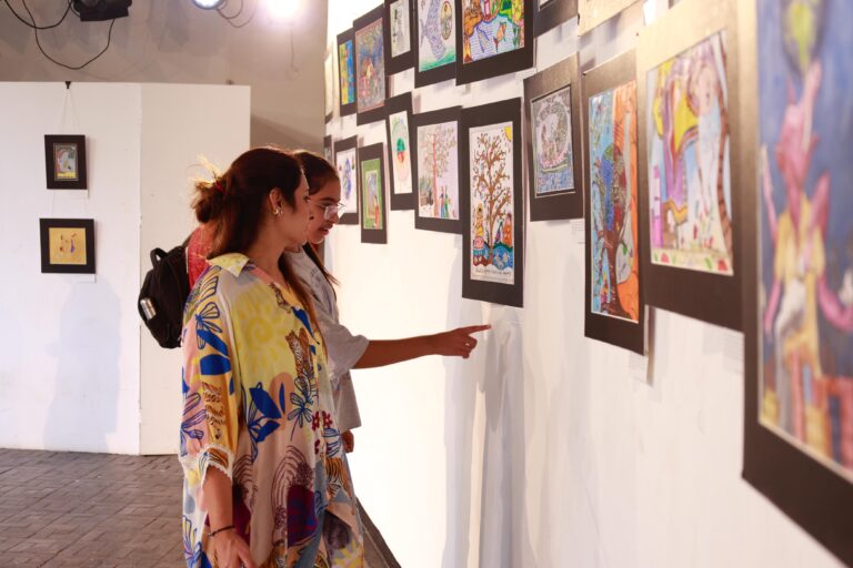 Visitors enjoying the Folk Art exhibition