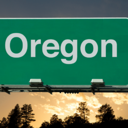 Oregon sign on highway.