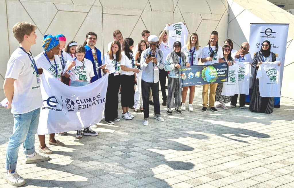 With rock star Nile Rodgers (center) at the #Education4Earth Press Conference, during COP28 Climate Summit in 2023 Dubai, United Arab Emirates.